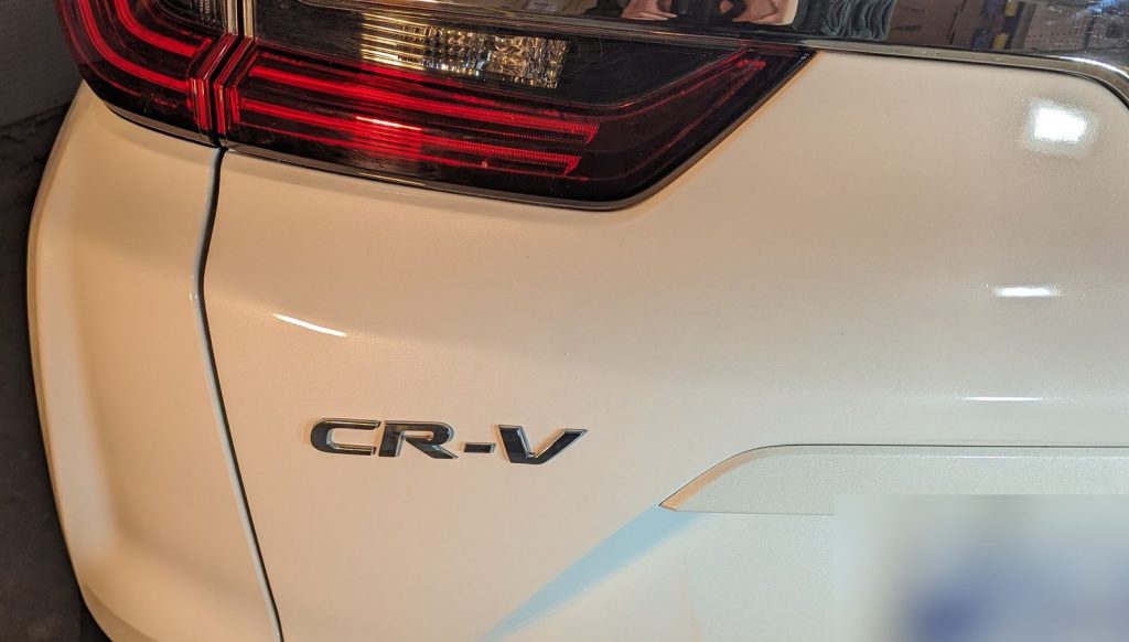 Honda CR-V tailgate after paintless dent repair, dent fully removed