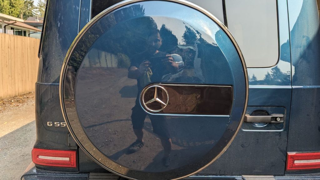 Mercedes-Benz G-Class spare tire cover restored and refitted after dent repair